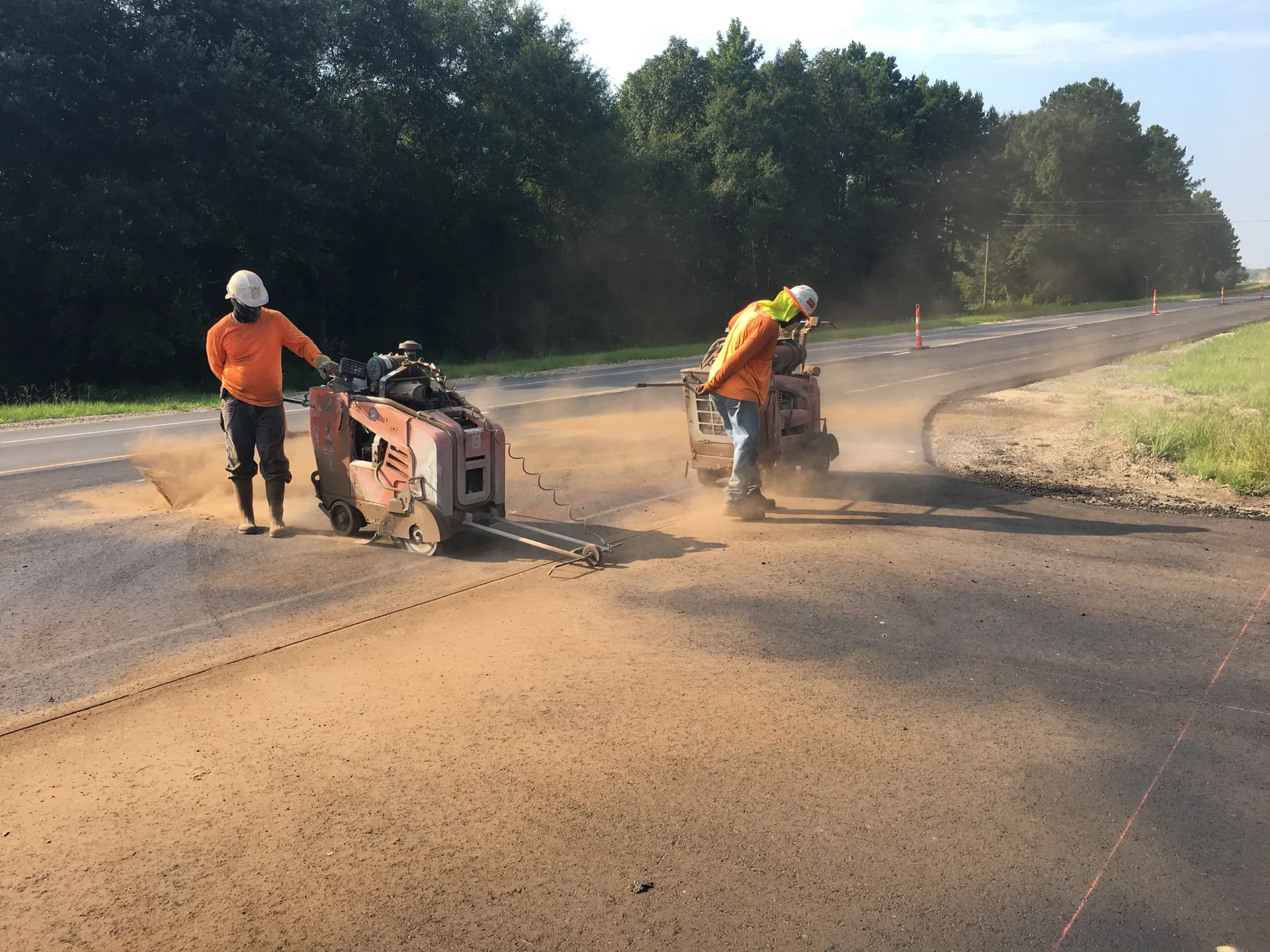 TNT Construction Group crew saw cutting and sealing a South Louisiana highway